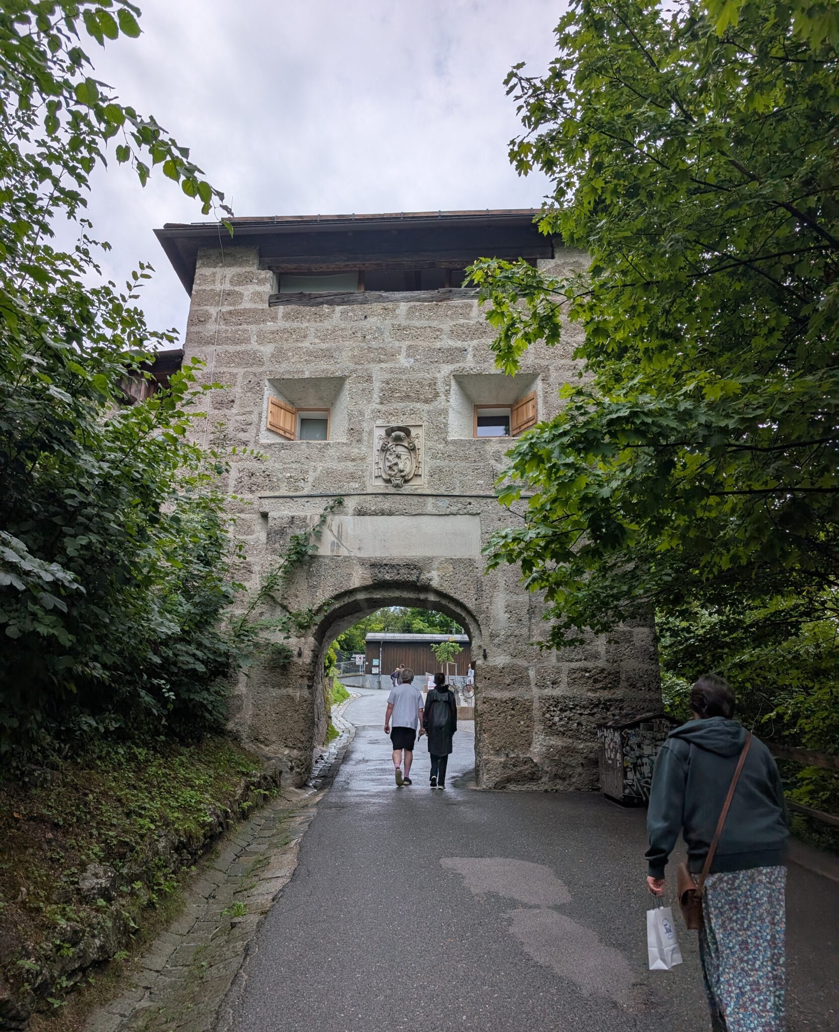 The stone gateway along the walking path leading up to Hohensalzburg Fortress