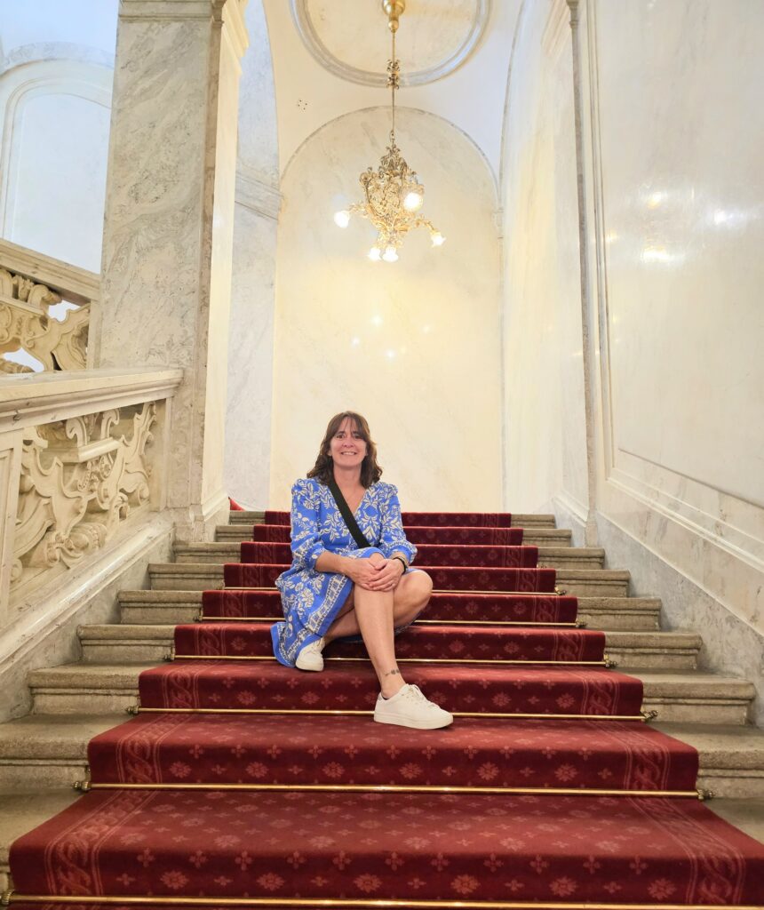 The grand staircase of the Sisi Museum within the Hofburg Palace. The Hofburg Palace served as the principal imperial winter residence of the Habsburg dynasty.