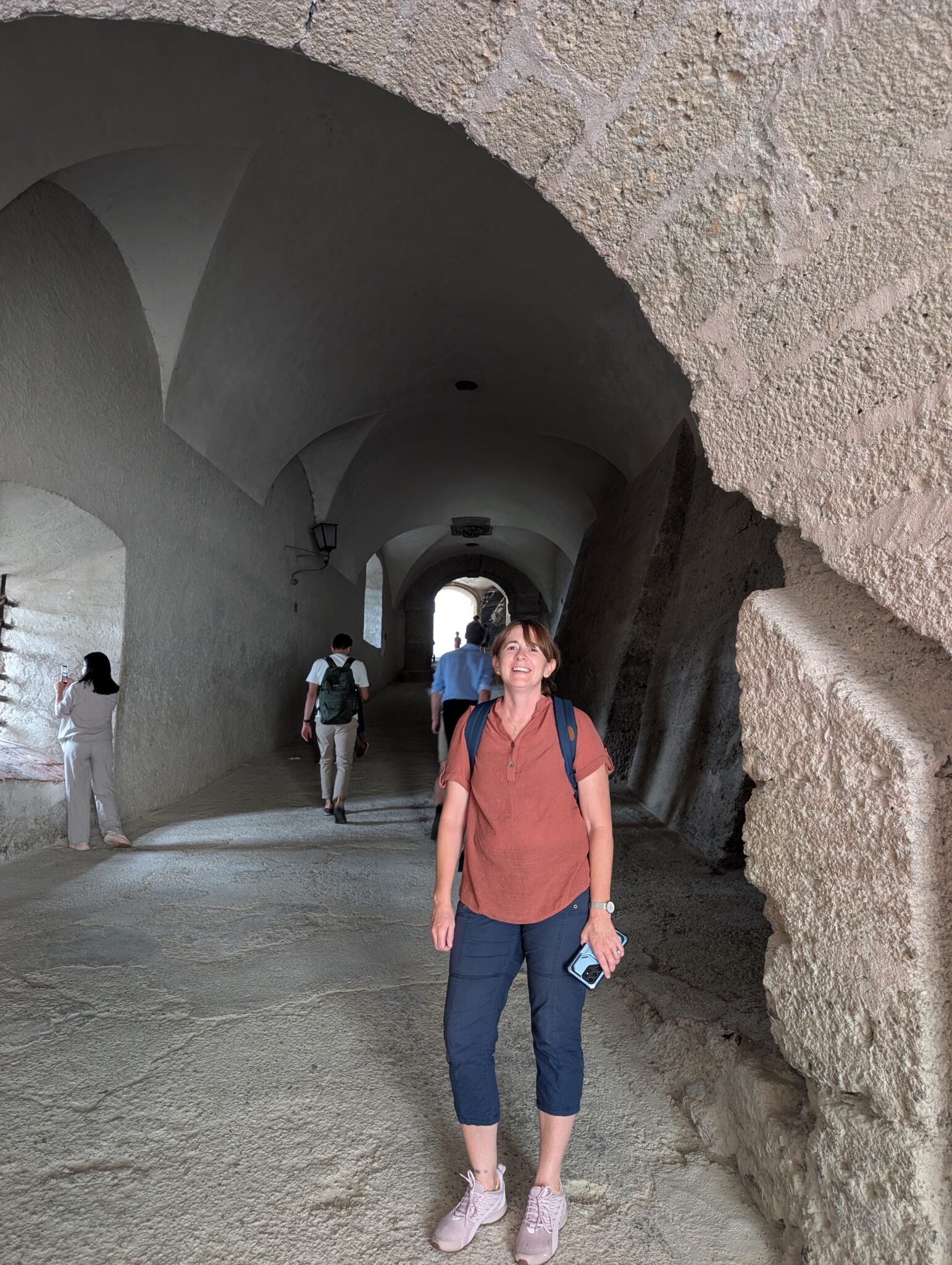 Me standing by the vaulted entry tunnels near the Rosspforte of the historic Hohensalzburg Fortress