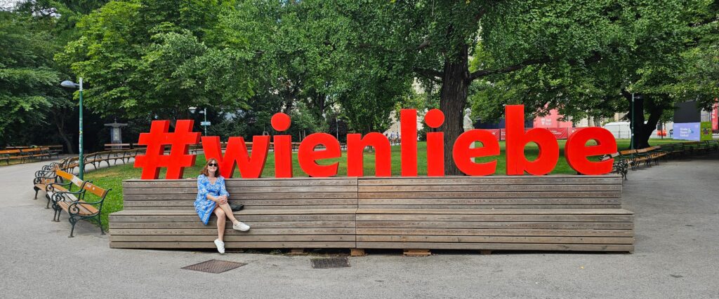 Wienliebe (Vienna Love) sign is a popular tourist spot located in the Rathauspark. in front of the Vienna City Hall (Rathaus)