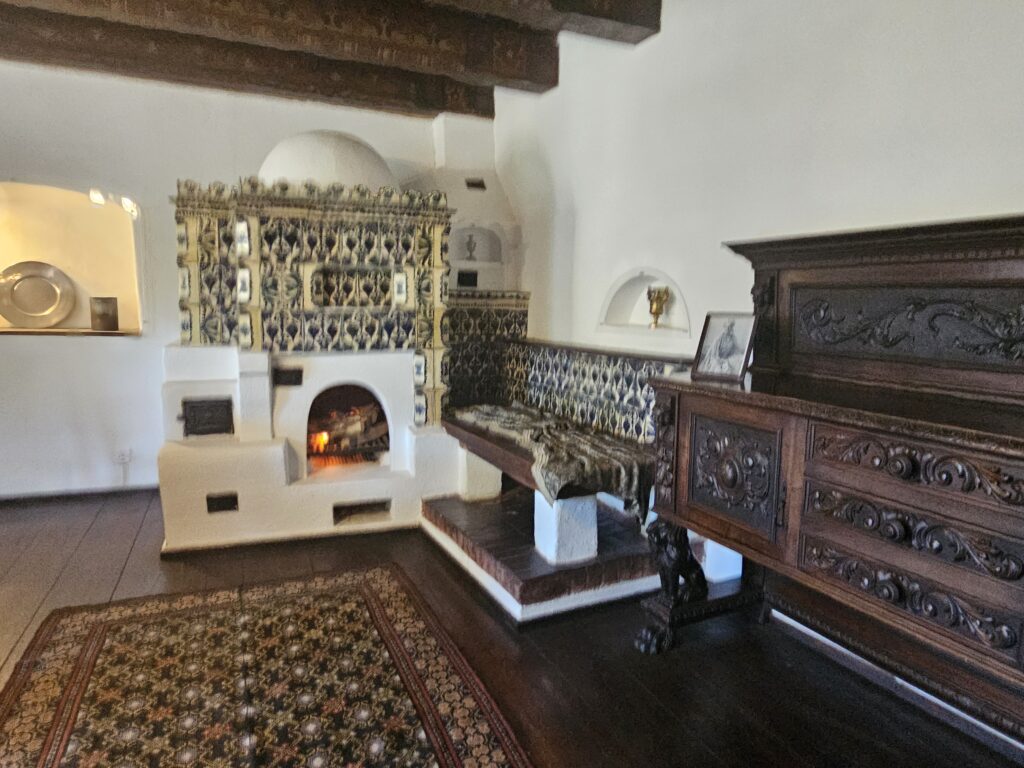 Originally build as medieval fortress and later as a royal residence the castle has a cozy feel with all the exposed wood.