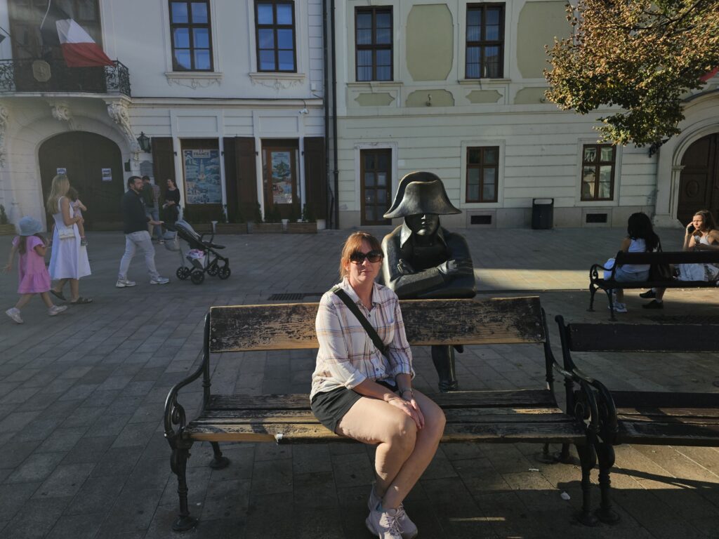 Old Town (Staré Mesto) of Bratislava, me sitting next to the famous Napoleon's Army Soldier Statue